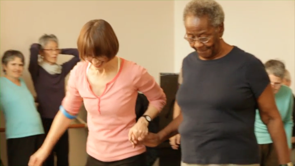 The advantage of having a teacher who knows both dance movement and Parkinson’s movement may seem obvious, but the diligence with which Pam Quinn constantly tries to communicate her ideas is what sets her apart. She is inventive, unflappable, open to suggestion and genuine in her concern for her students. Her exercises strike at the very heart of the disease we are all battling. –Joy Esterberg
